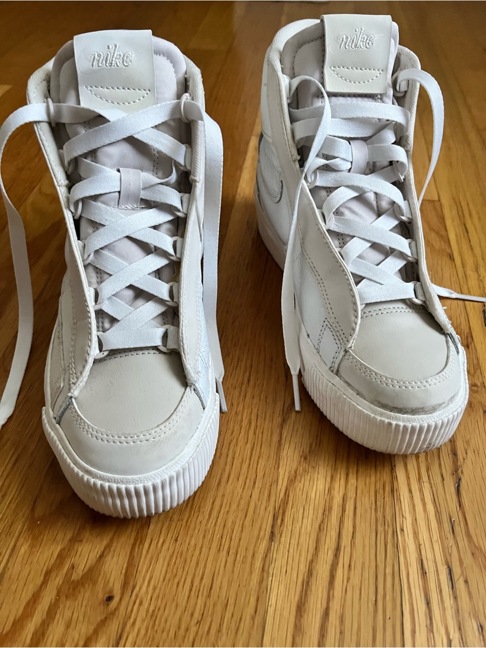 Nike White High-Top Sneakers with Subtle Stitch Detailing